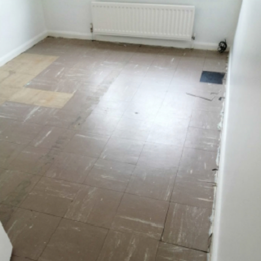 Brown asbestos tile flooring