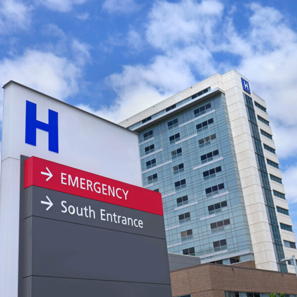 Close up of a sign outside of a hospital building