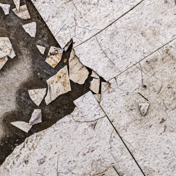 Broken floor tiles.